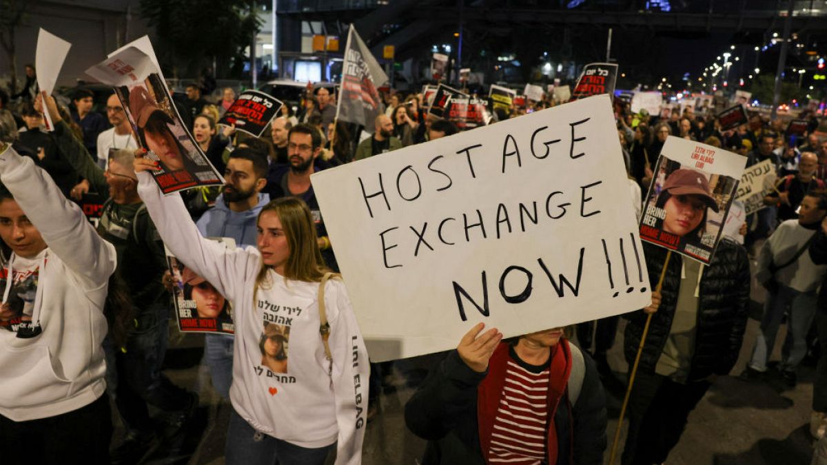 Families and supporters of hostages hostages held by Hamas demonstrate in Tel Aviv calling for an immediate hostage exchange deal