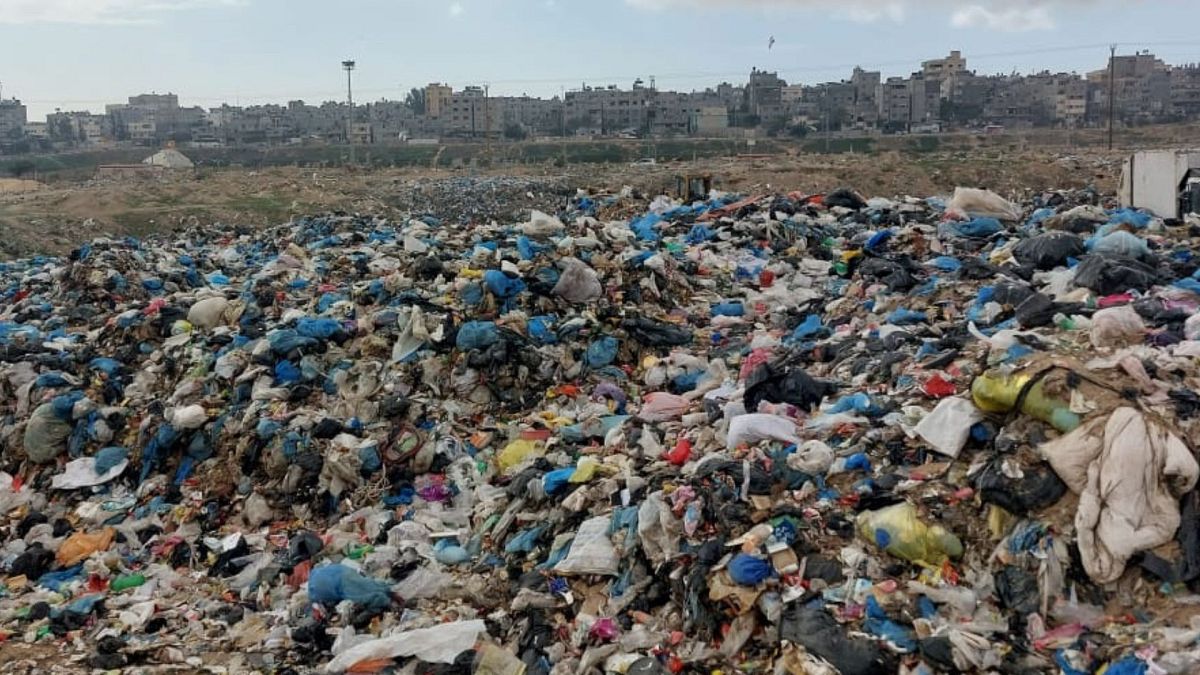 After the main landfill was bombed earlier this month, the Khan Younis municipality had to dumb rubbish in a temporary landfill