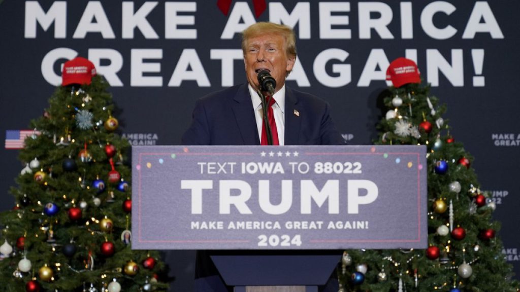 Former President Donald Trump speaks during a commit to caucus rally in Waterloo, Iowa on Tuesday