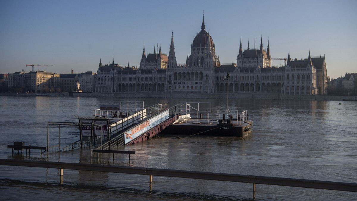 The River Danube bursts its banks and floods the Angelo Rotta quay in downtown Budapest, Hungary, Thursday, Dec. 28, 2023.