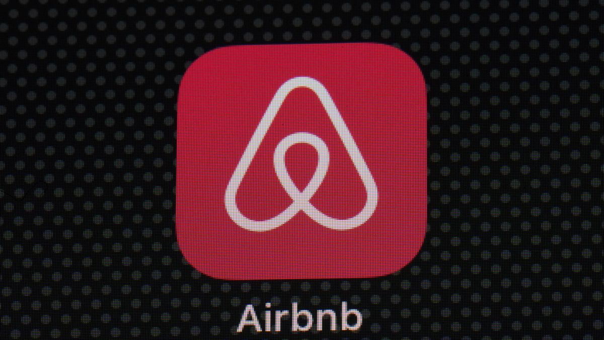 The Airbnb app icon is displayed on an iPad screen in Washington, D.C., on May 8, 2021.