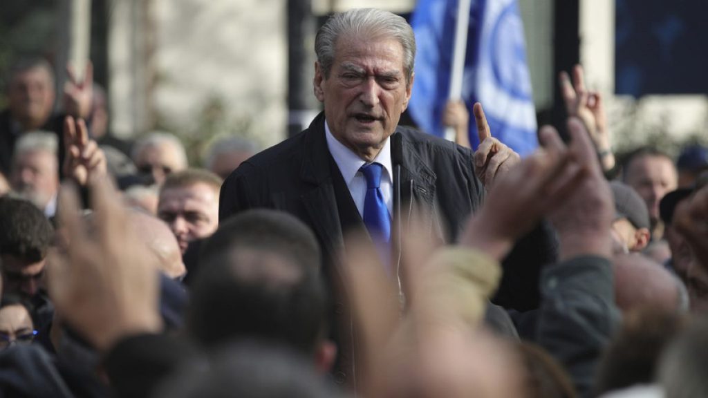 Sali Berisha, leader of the opposition Democratic Party, speaks to his supporters An Albanian court on Saturday,