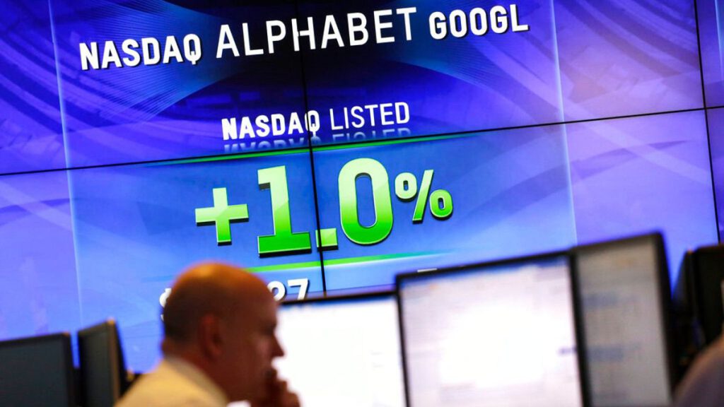 Electronic screens post the price of Alphabet stock.