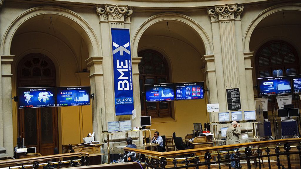 Brokers work at the Stock Exchange in Madrid (file photo)