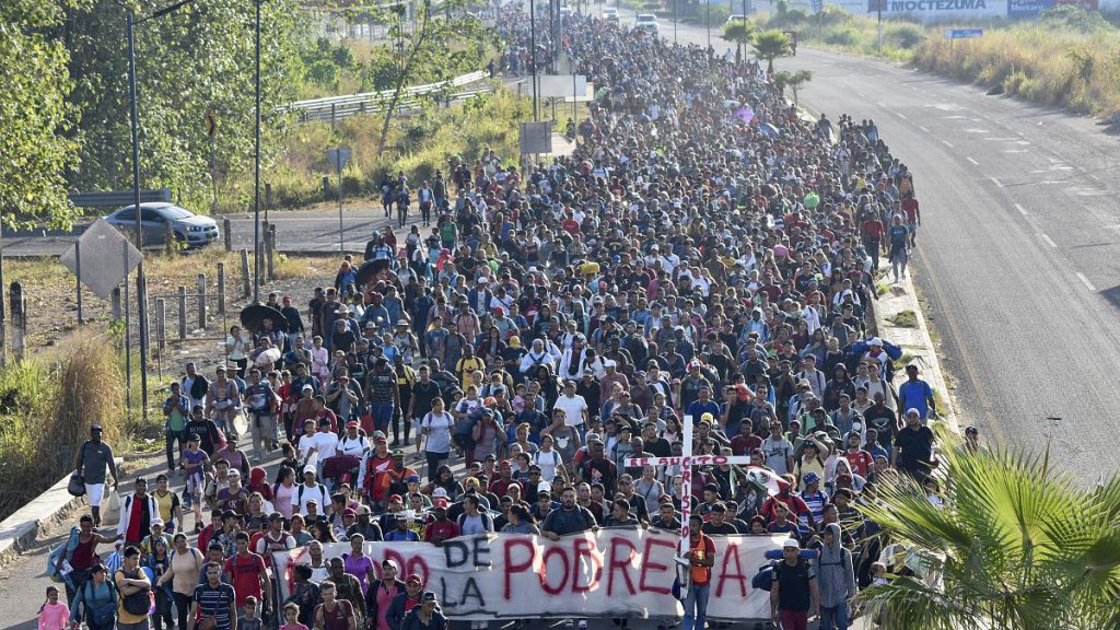 Migrants depart from Tapachula, Mexico, Sunday, Dec. 24, 2023.