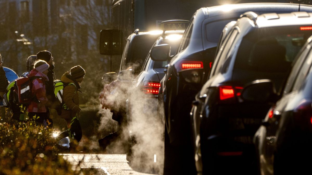 Children head to school in Frankfurt, Germany, 2023. New EU pollution limits target for the first time harmful particulate matter from brakes and tyres.