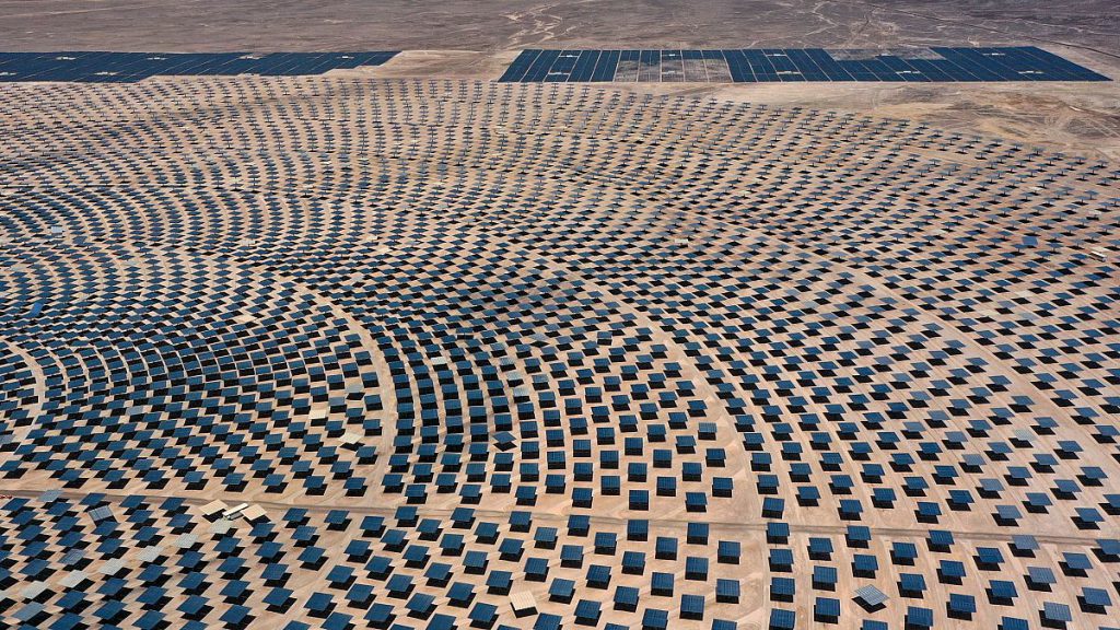 A 240-meter solar thermal tower surrounded by mirrors is operating as a symbol of the biggest energy revolution against climate change in Latin America.