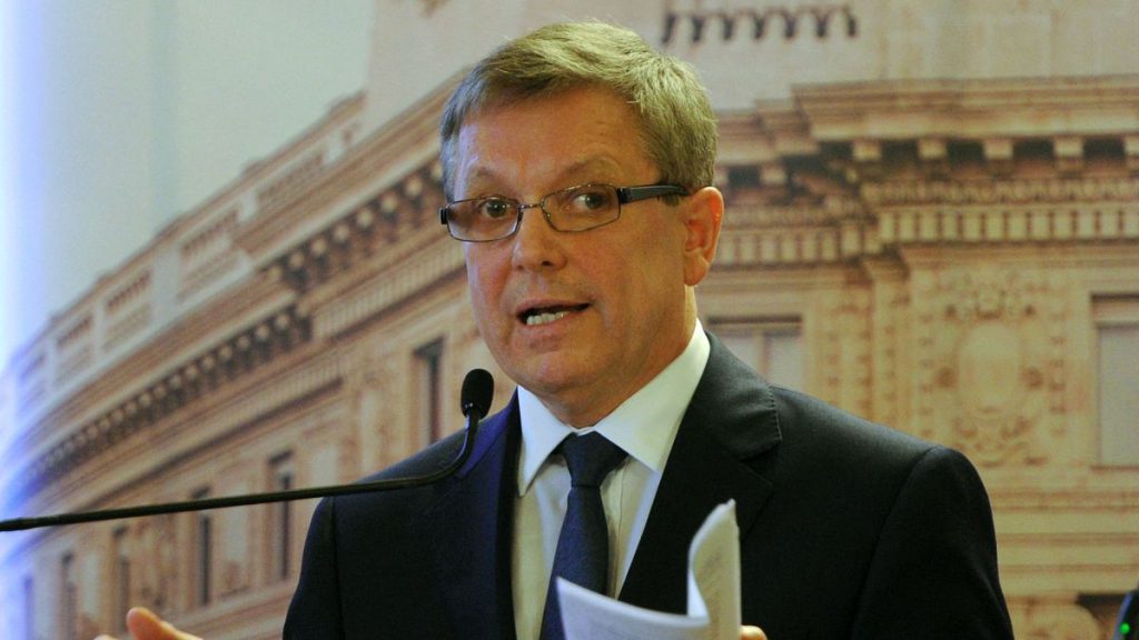 New governor of Hungarian Central Bank (MNB) Gyorgy Matolcsy informs the press about their new financial deal in the main hall of the MNB headquarters in Budapest.