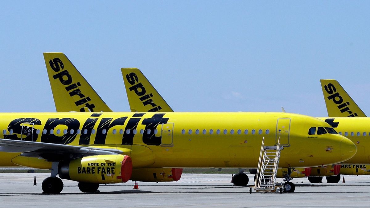 A line of Spirit Airlines jets sit on the tarmac at Orlando International Airport on 20 May 2020, in Orlando, Florida.