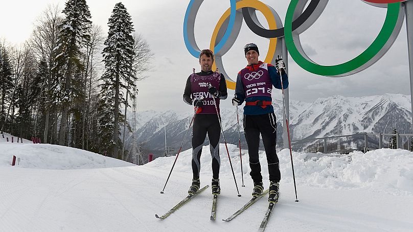 Książę koronny Danii Frederik na zdjęciu z sportowcem Martinem Mullerem podczas 13. dnia Zimowych Igrzysk Olimpijskich 2014 w Soczi, 20 lutego 2014 r.