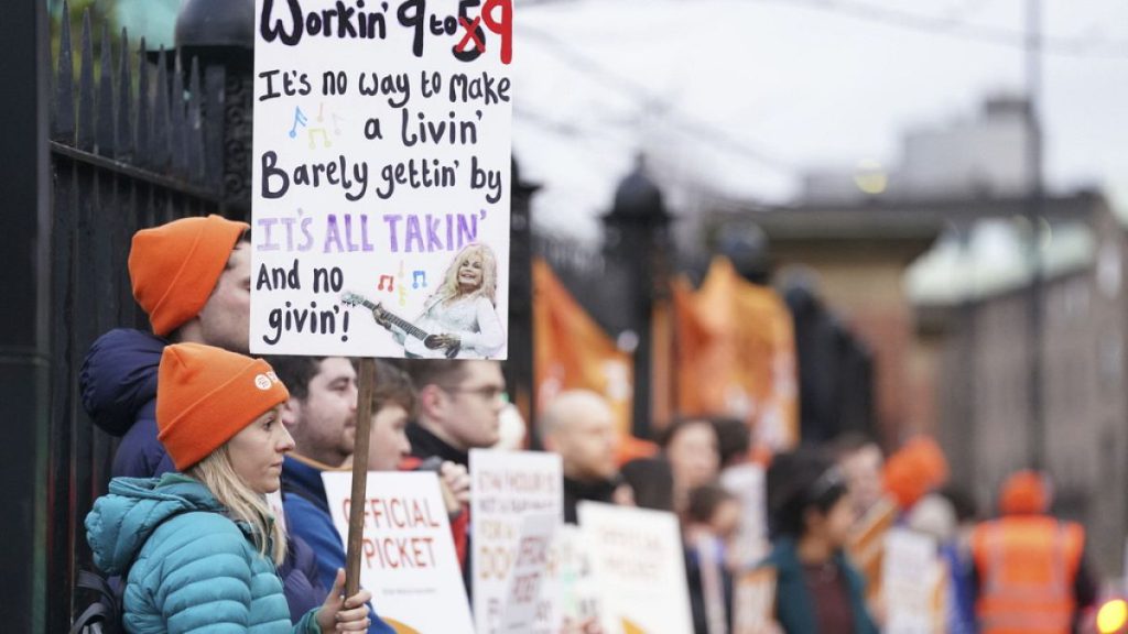 Junior doctors and members of the British Medical Association (BMA) demonstrate outside Royal Victoria Infirmary, Newcastle, England on Wednesday