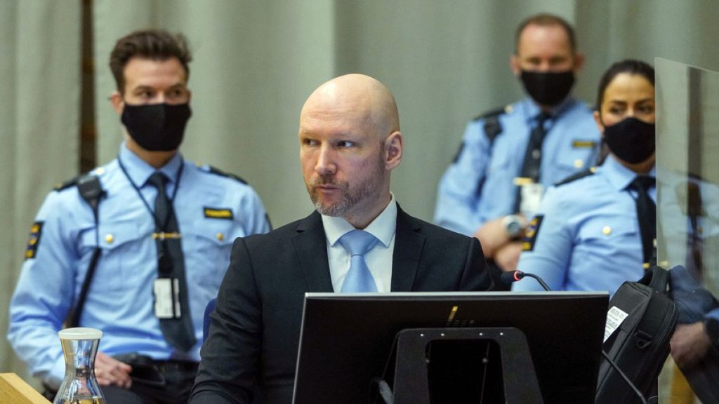Convicted mass murderer Anders Behring Breivik sits in the makeshift courtroom in Skien prison on the second day of his parole hearing in 2022