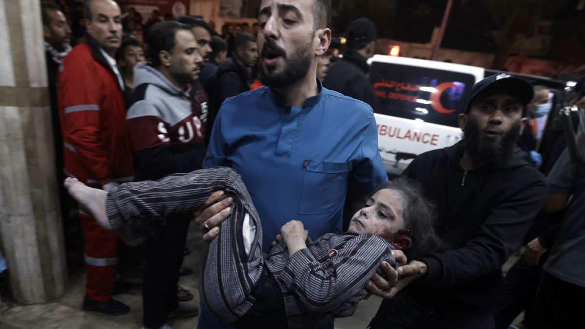 A Palestinian child wounded during the Israeli bombardment of the Gaza Strip is brought to the Nasser hospital in Khan Younis, Southern Gaza Strip