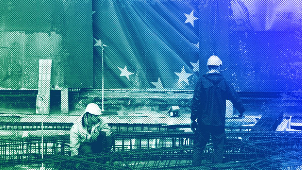 Construction workers work on a new entrance at EU headquarters in Brussels, October 2019