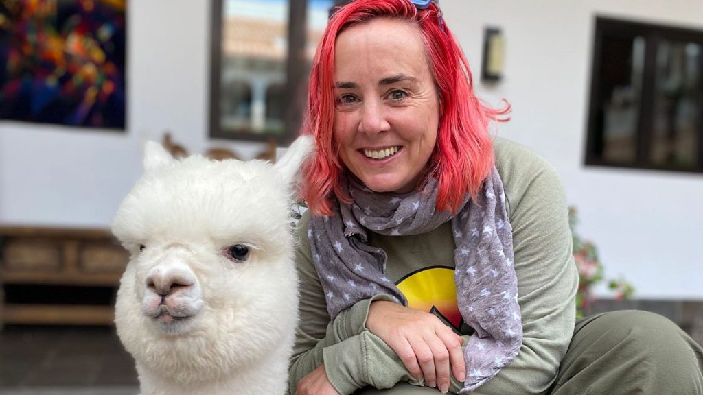 Tamara in Peru after being reunited with her suitcase.