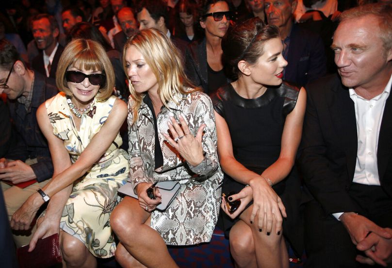 Anna Wintour, Kate Moss, księżniczka Charlotte Casiraghi i Francois Pinault biorą udział w pokazie kolekcji wiosna-lato 2015 dla kobiet Gucci podczas Tygodnia Mody w Mediolanie, 17 września 2014 r.