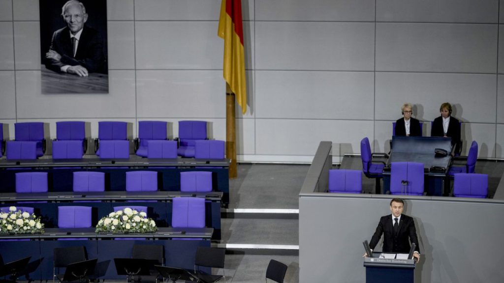 French President Emmanuel Macron delivers a speech during a state ceremony to commemorate late former German finance minister Wolfgang Schaeuble in the German parliament.