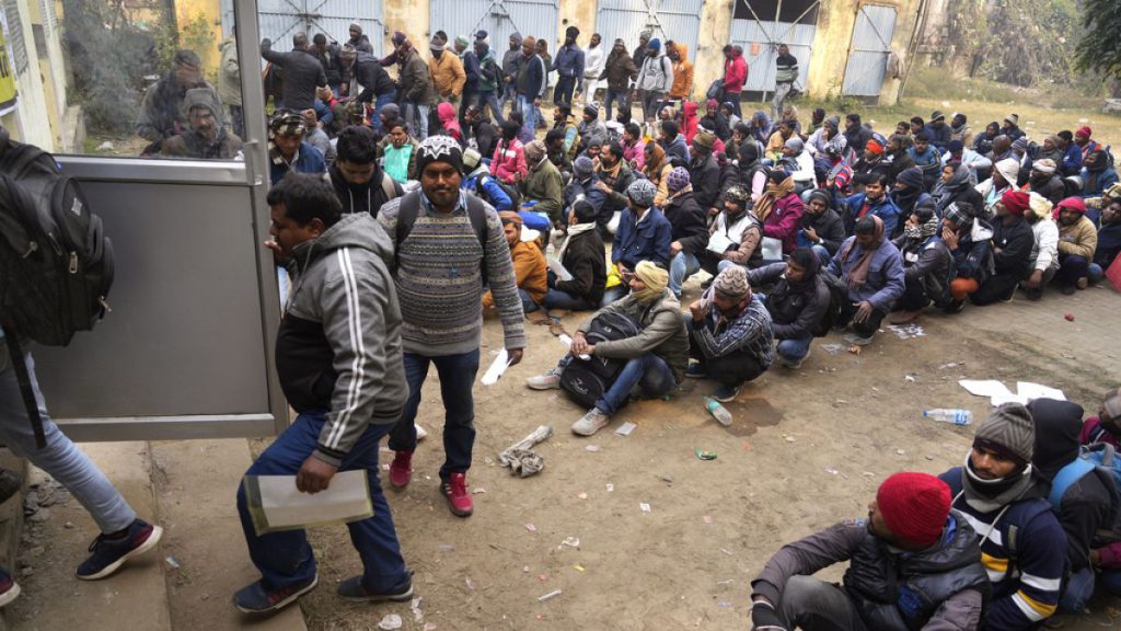 Indian workers aspiring to be hired for jobs in Israel line up during a recruitment drive in Lucknow, India, Thursday, Jan. 25, 2024.