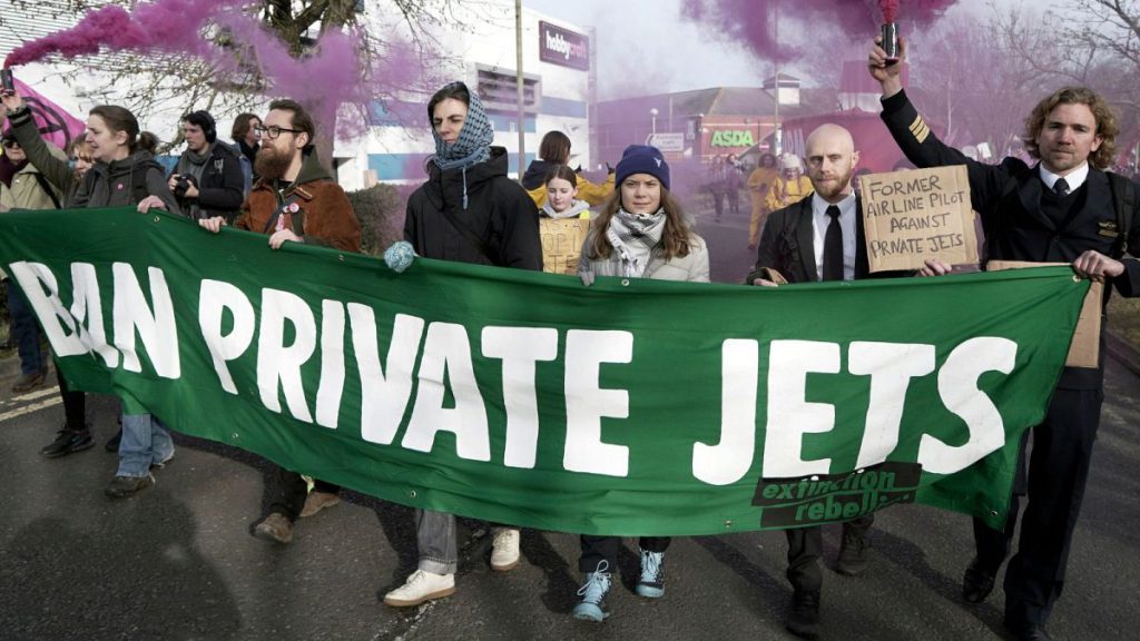 Climate activist Greta Thunberg takes part in a march to Farnborough Airport in southern England,27 January 2024.