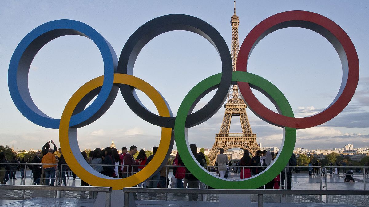 The Olympic rings are set up at Trocadero plaza that overlooks the Eiffel Tower in Paris on Sept. 14, 2017.