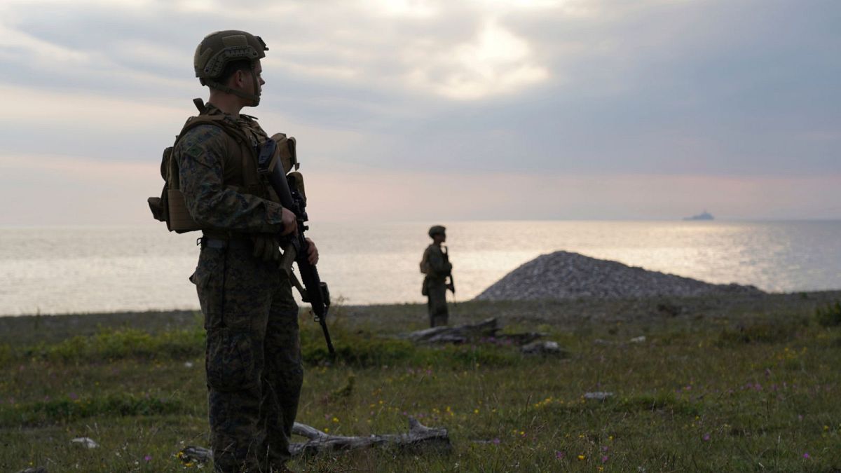 US troops on Gotland beach following amphibious landing drill, part of BALTOPS annual Baltic Sea military exercise in Tofta, Gotland, Sweden on Wednesday, June, 7, 2022.