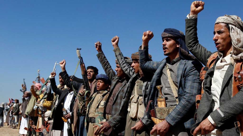 Houthi fighters and tribesmen stage a rally against the U.S. and the U.K. strikes on Houthi-run military sites near Sanaa, Yemen, on Sunday, Jan. 14, 2024.