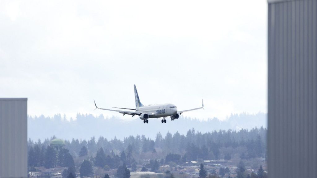 An Alaska Airlines Boeing 737-990ER flight 337 from Fort Lauderdale, Fla., lands at Portland International Airport in Portland, Ore., Saturday, Jan. 6, 2024.