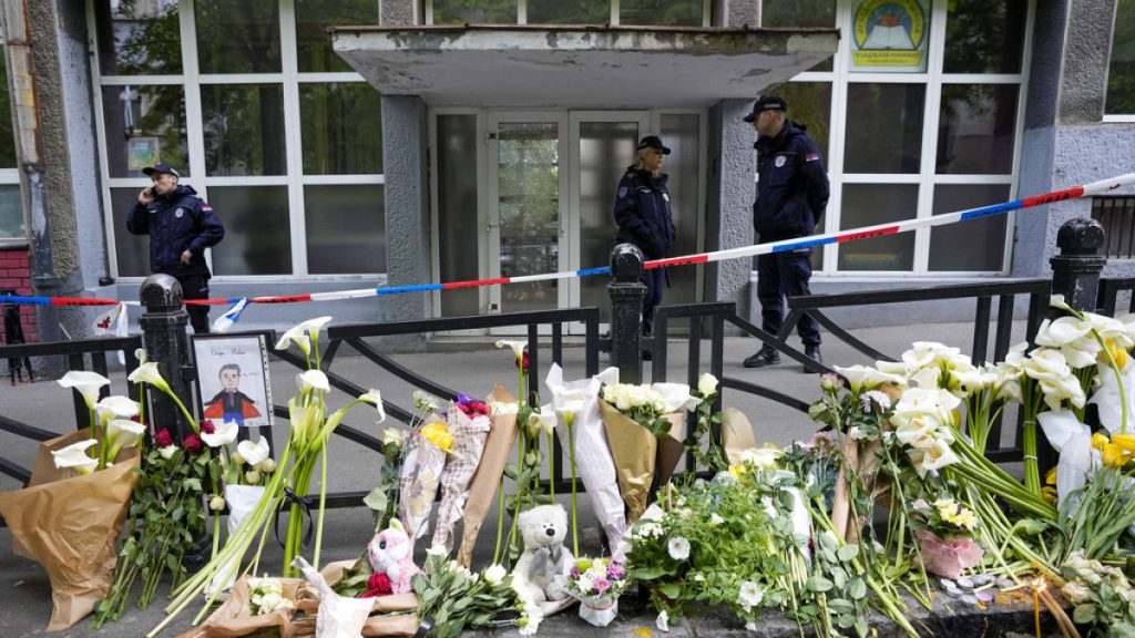 Police officers guard the Vladimir Ribnikar school in Belgrade, Serbia, on May 4, 2023 after a 13-year-old opened fire killing fellow students and a guard.
