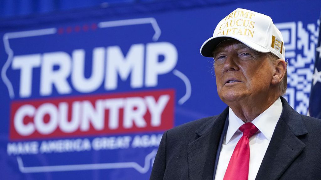 Republican presidential candidate former President Donald Trump arrives to speak at a rally at Simpson College in Indianola, Iowa, Sunday, Jan. 14, 2024