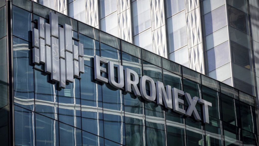 The logo of Euronext is pictured at its headquarters in the La Defense business district in Courbevoie near Paris, France, Wednesday, March 1, 2023. (AP Photo/Aurelien Morissa