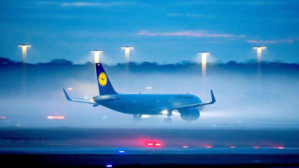 An aircraft starts at the airport in Frankfurt, Germany, on a hazy Wednesday morning, 31 January 2024.