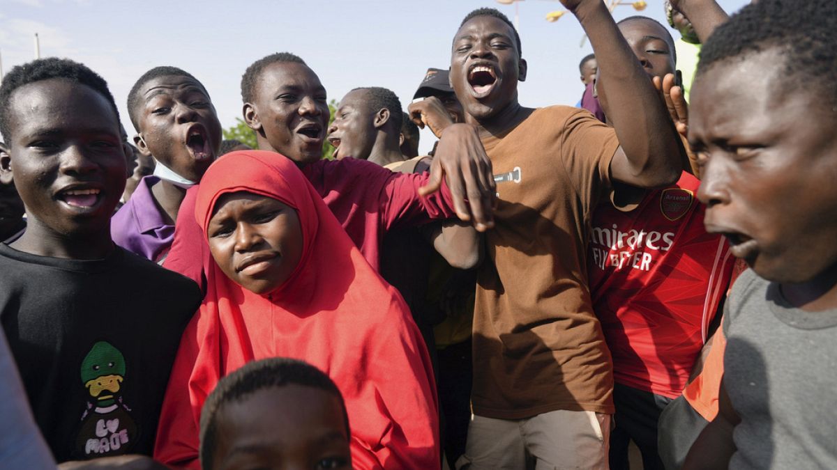 Young people gather to register to volunteer to fight for the country as part of a volunteer initiative, in Niamey, Niger, on Aug. 19, 2023.