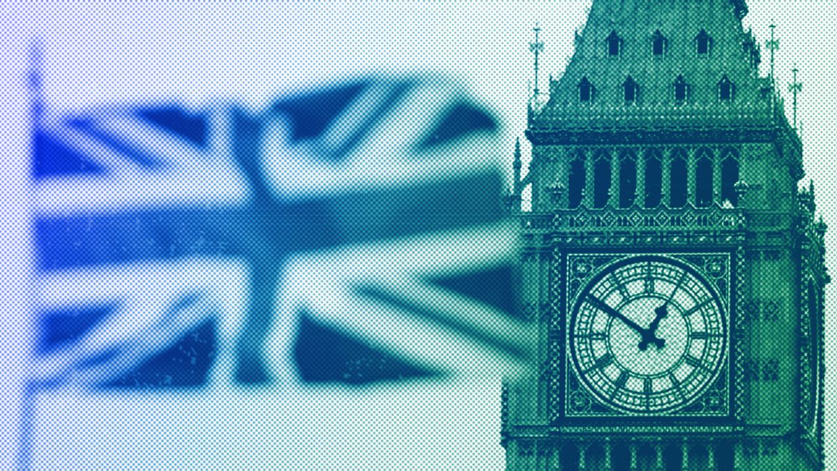 British Union flag waves in front of the Elizabeth Tower at Houses of Parliament containing the bell know as