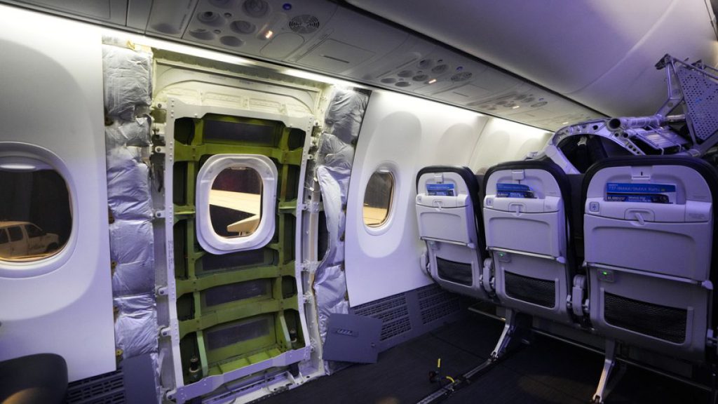 A door plug area of an Alaska Airlines Boeing 737 Max 9 aircraft awaits inspection