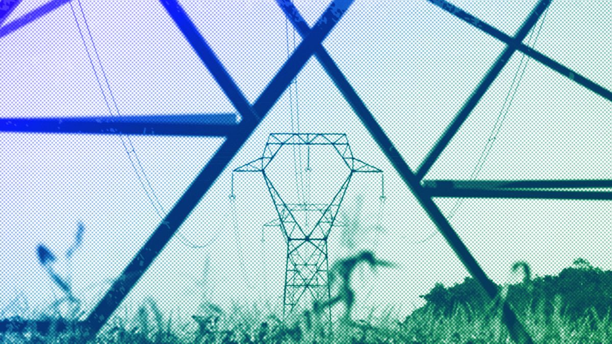 Electricity poles are seen in the countryside outside Lyon, September 2022