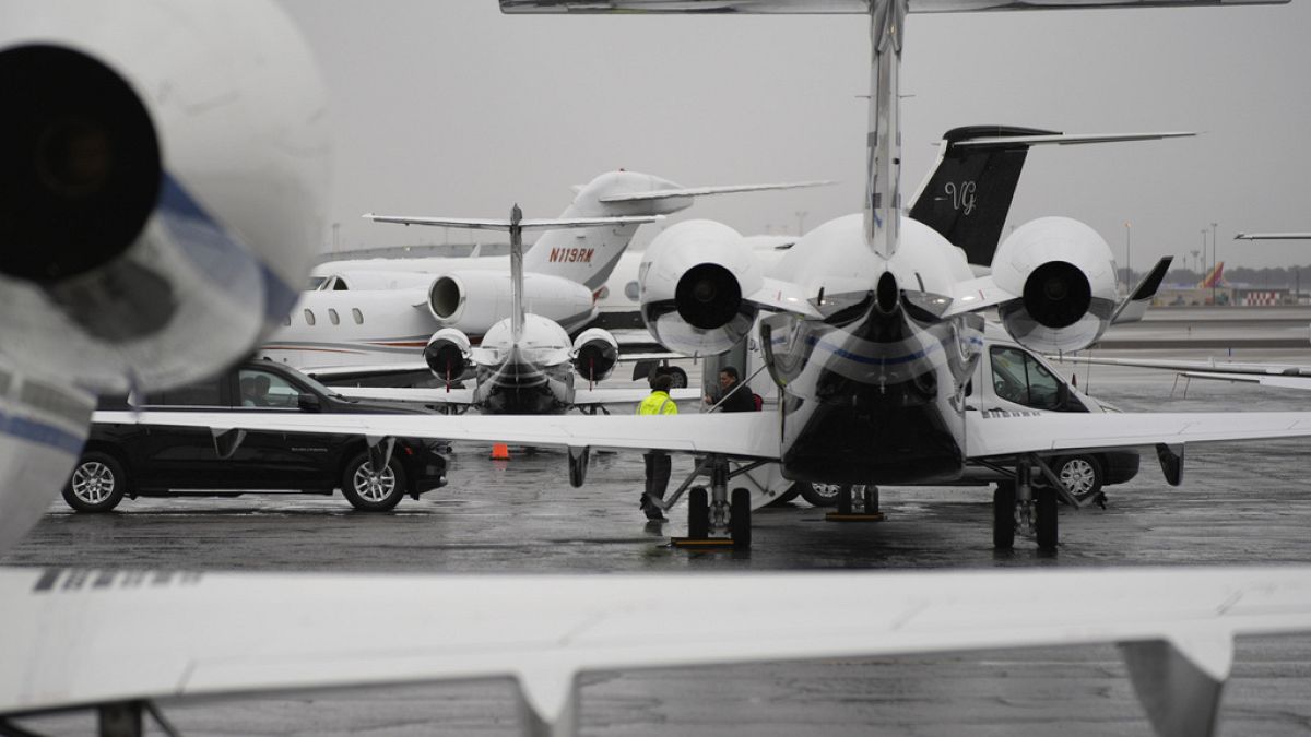 Planes are parked at a private jet terminal at Harry Reid International Airport in Las Vegas on Thursday, ahead of the Super Bowl this weekend