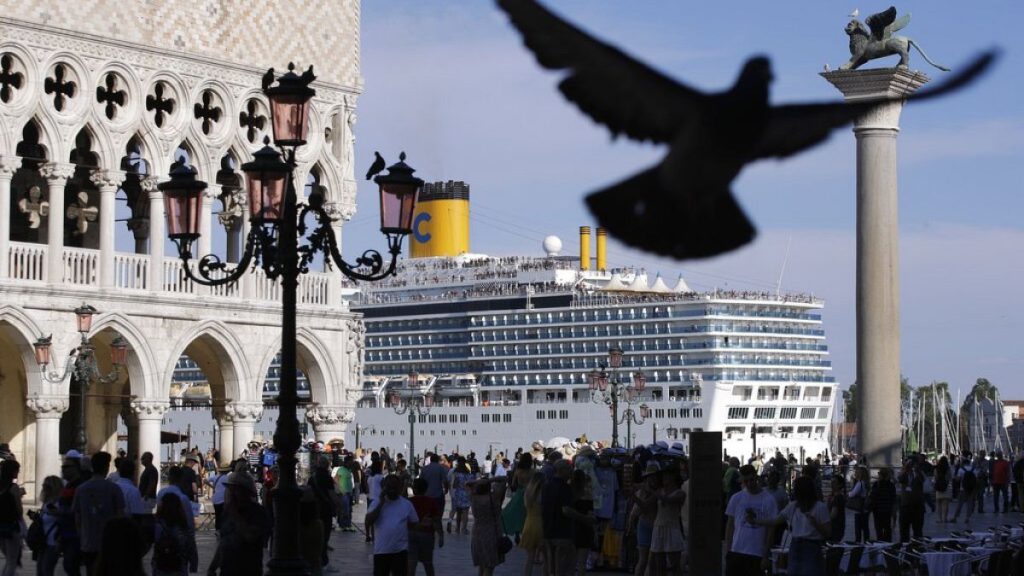 In this file photo, a cruise ship passes by St. Mark
