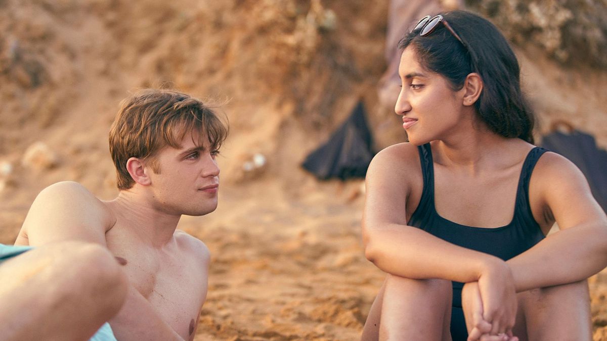 Ambika Mod, right, and Leo Woodall in a scene from the mini-series