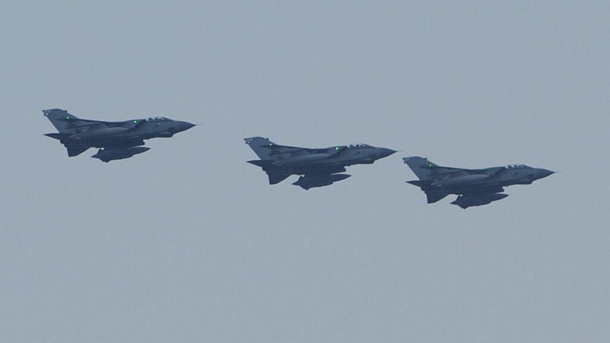 FILE - Tornados surveillance aircrafts come in to land at the British Royal Air Force Base at Akrotiri, near the southern port city of Limassol, Cyprus, on Wednesday, Aug. 13,