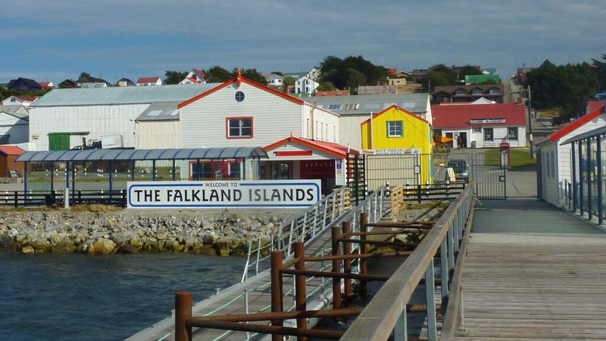 In this March 8, 2012 photo, a sign welcomes people at the port where cruise ships arrive in Stanley, Falkland Islands.