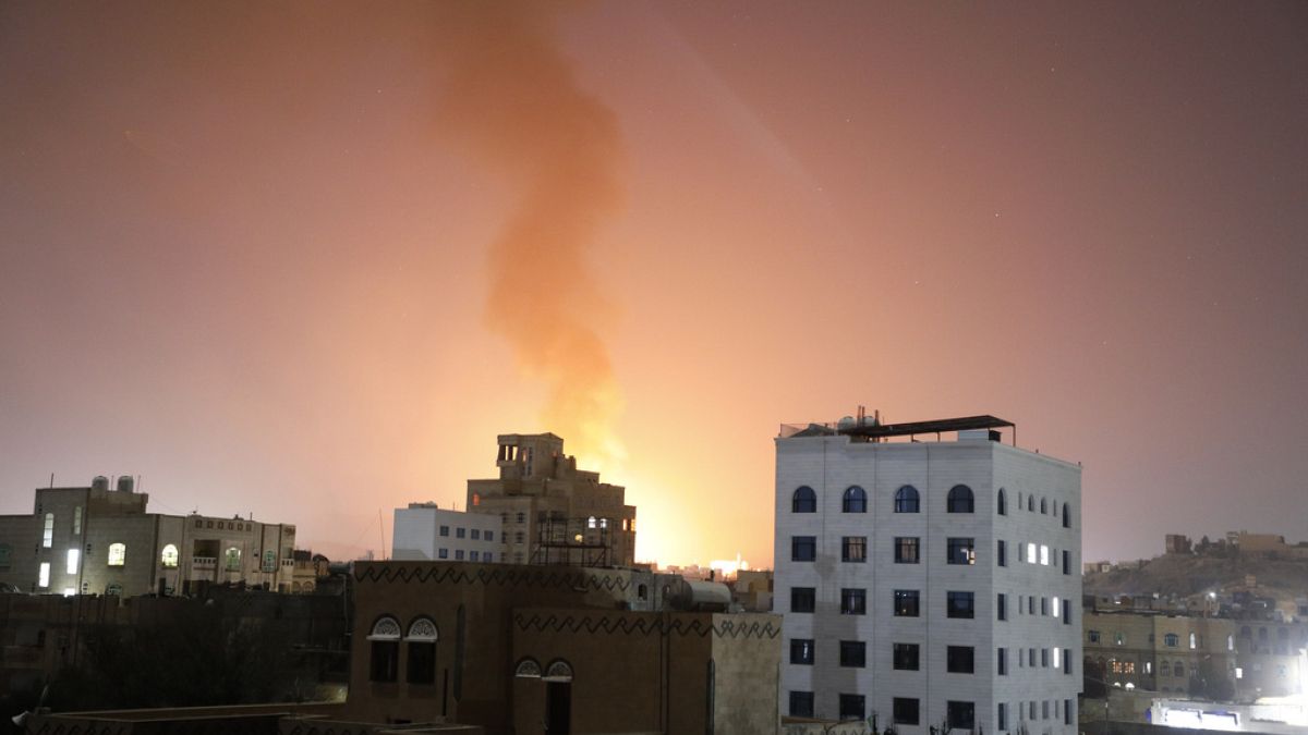 Smoke rises after the U.S.-led airstrikes on hit targets in Sanaa, Yemen, Sunday, Feb. 25, 2024.