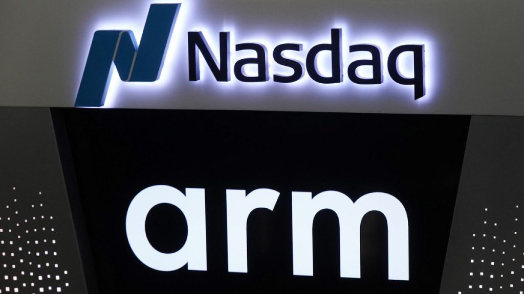 The logos for ARM Holdings and the Nasdaq are shown during the ARM Holdings IPO, in New York