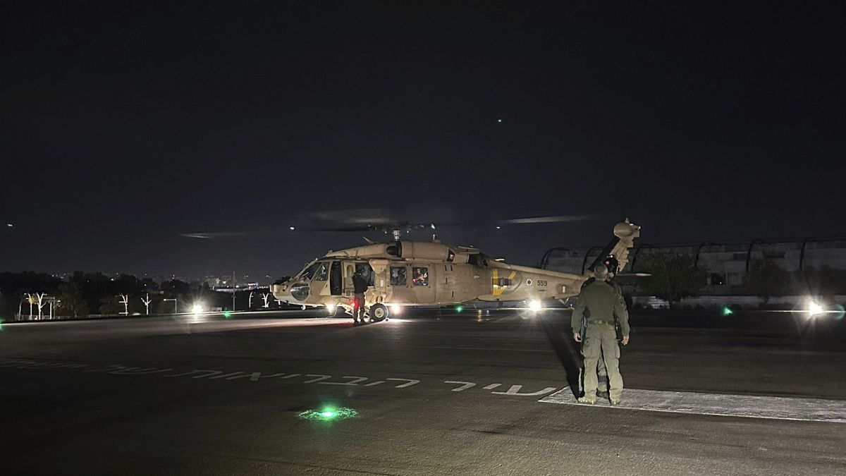 In this photo provided by the Israeli military, shows an Israeli Air Force helicopter carrying two released hostages, at Sheba Medical Center in Ramat Gan, Israel.