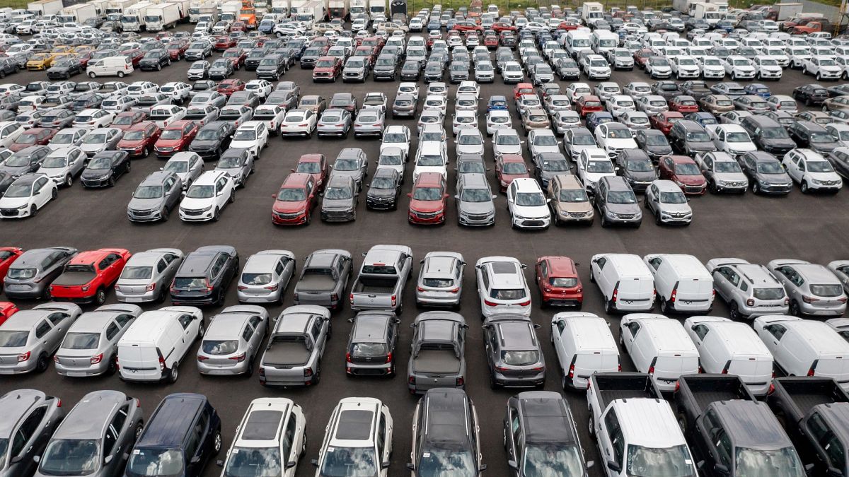 Cars in a parking lot.