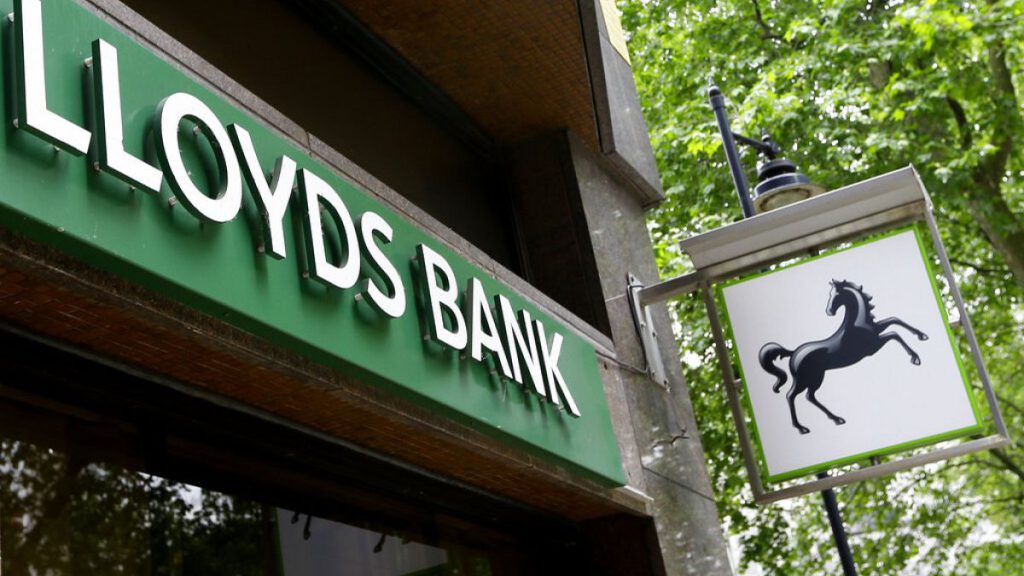 In this file photo dated Friday, June 5, 2015, The sign showing the Lloyds Bank logo at a branch in London.