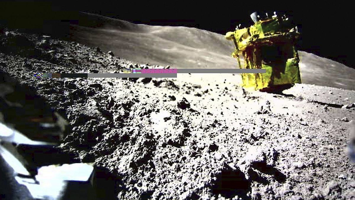 An image taken by a Lunar Excursion Vehicle 2 (LEV-2) of a robotic moon rover called Smart Lander for Investigating Moon, or SLIM, on the moon.