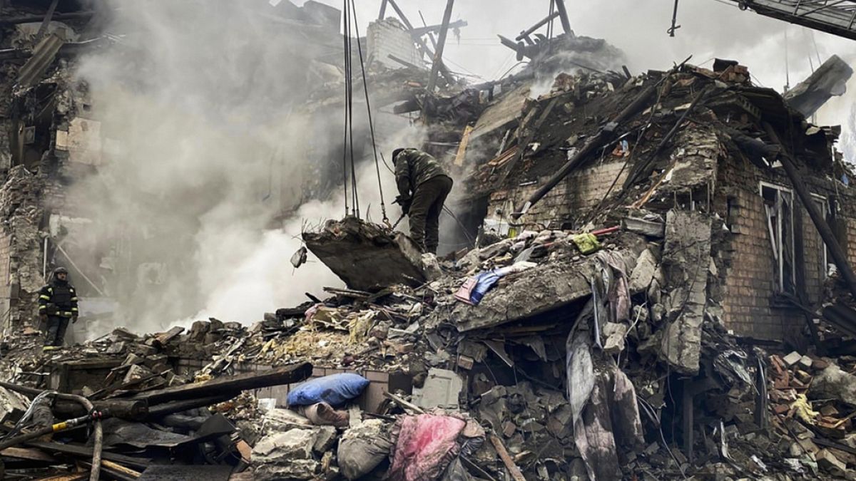 Rescuers work at the scene of a building damaged by shelling, in Novogrodivka,  Ukraine, Thursday, 30 November, 2023. (