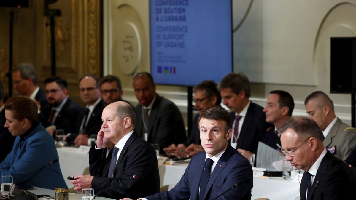 French President Emmanuel Macron, center right, delivers a speech at the Elysee Palace in Paris, Monday, Feb. 26, 2024.