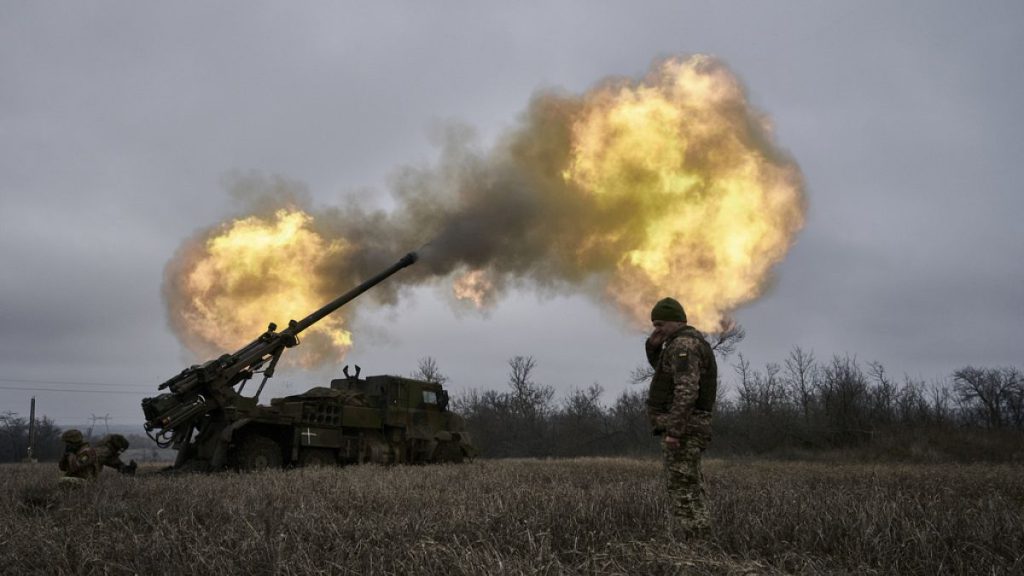 FILE - Ukrainian soldiers fire a French-made CAESAR self-propelled howitzer towards Russian positions near Avdiivka, Donetsk region, Ukraine, Monday, Dec. 26, 2022.