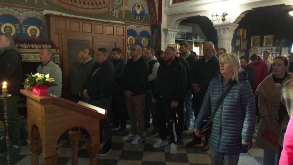 Worshippers in an orthodox church in Montenegro.